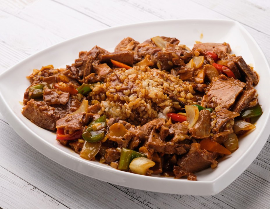 Жареный язык с шампиньонами в соусе